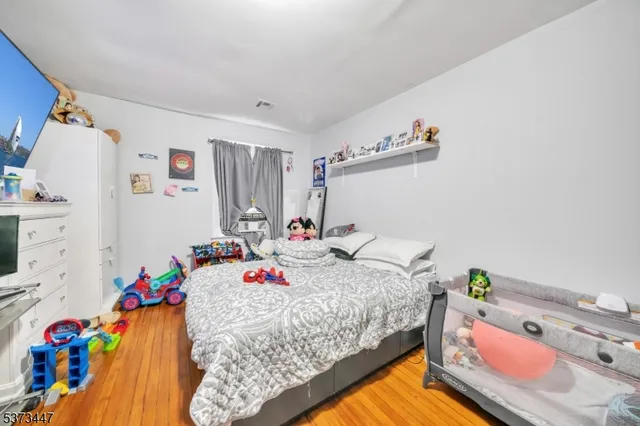 a bed room with a bed and a bed