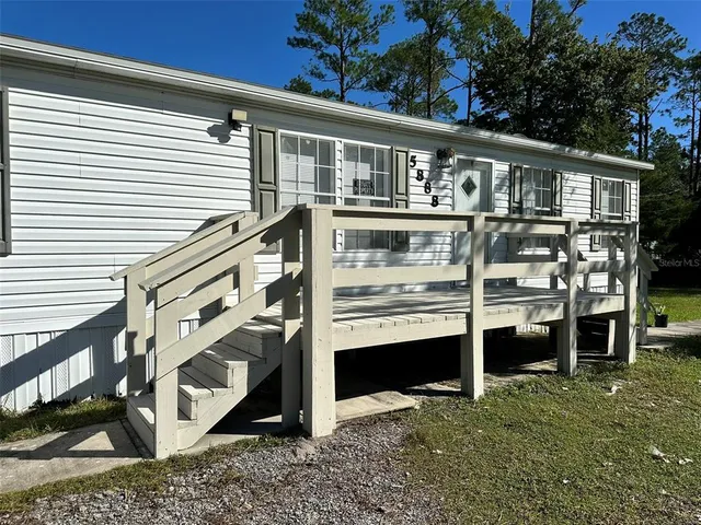a view of a house with a balcony