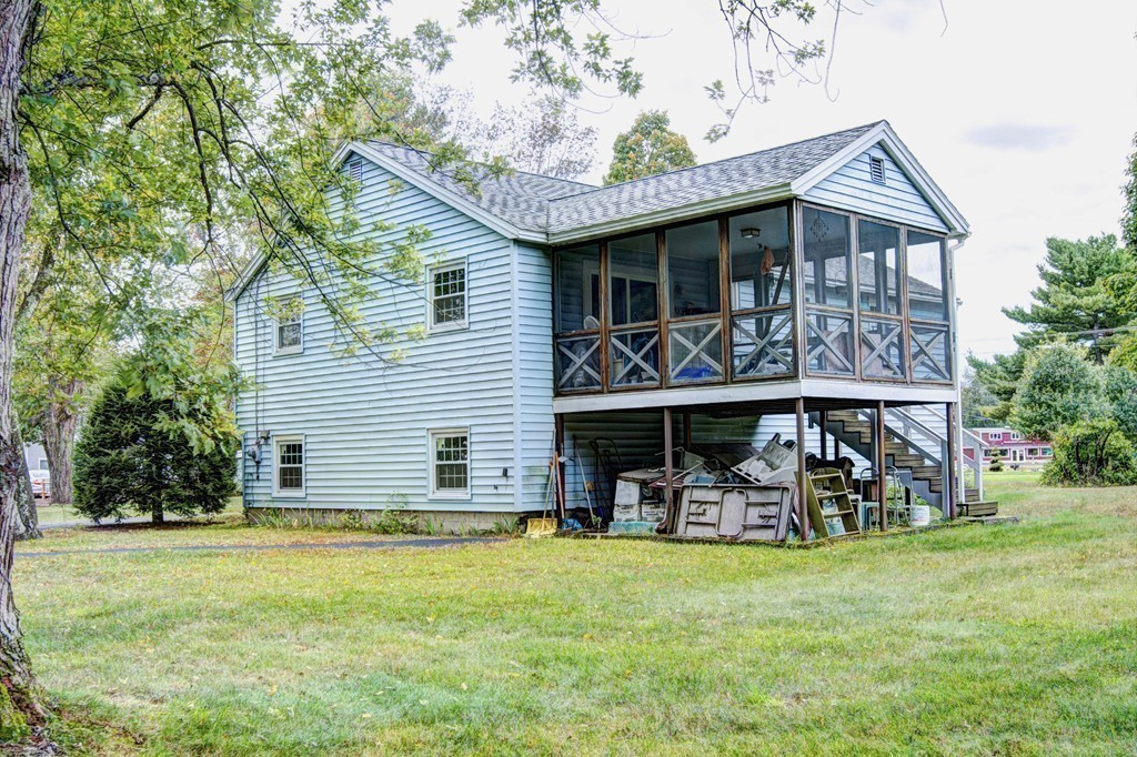 12 Mill Road Chelmsford, MA 01824 - Photo 10 of 11 a front view of a house with patio