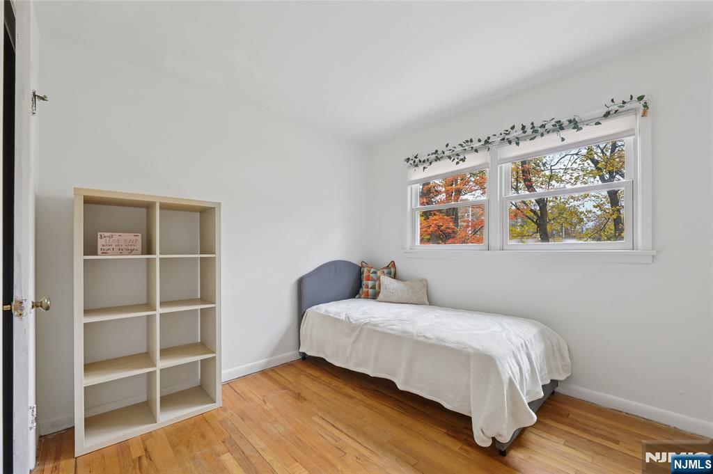407 Semino Road Northvale, NJ 07647 - Photo 13 of 23 a bedroom with a bed and a window