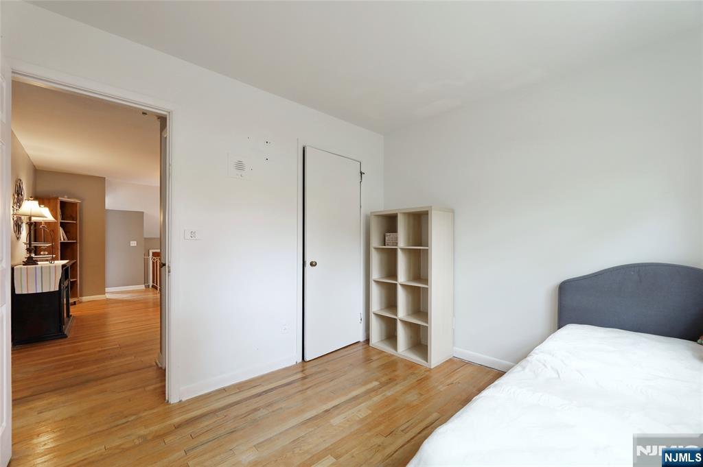 407 Semino Road Northvale, NJ 07647 - Photo 14 of 23 a bedroom with a bed and a view of kitchen