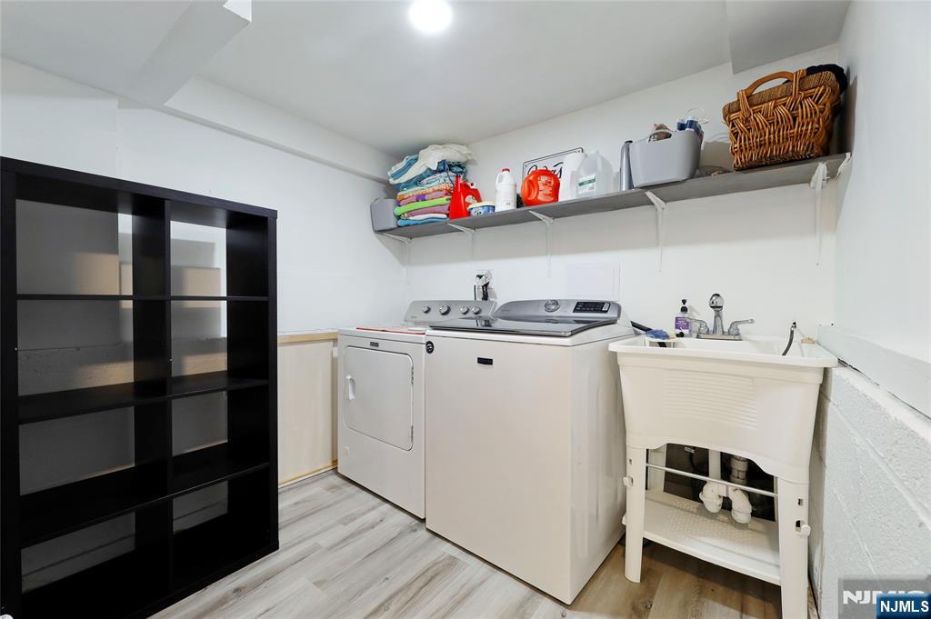 407 Semino Road Northvale, NJ 07647 - Photo 23 of 23 a utility room with dryer and washer