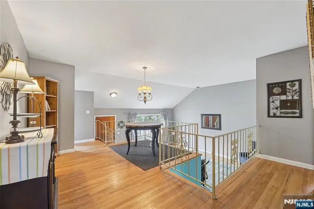 a kitchen with cabinets appliances and a window