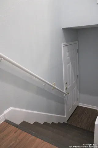 a view of an empty walk in closet