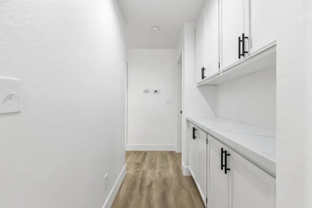 a view of a hallway with closet