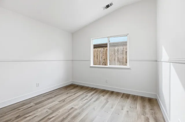 an empty room with a window