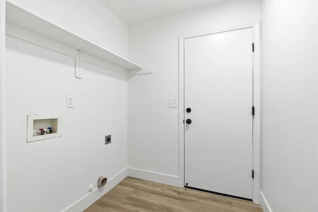 a view of small space with wooden floor