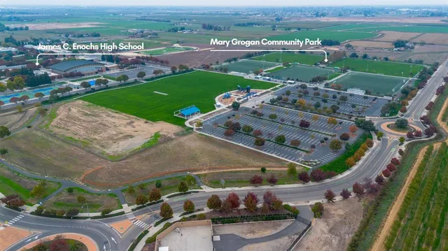 an aerial view of a house with a garden