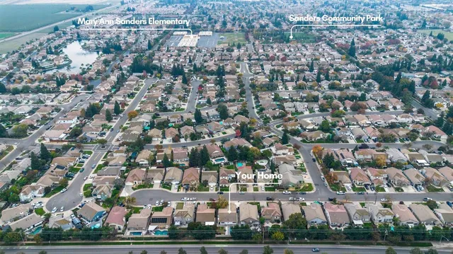 an aerial view of residential building with parking space