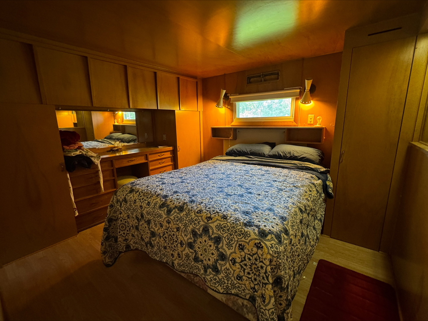 201 East Elm Street Chatsworth, IL 60921 - Photo 7 of 14 a bed sitting in a room next to a window