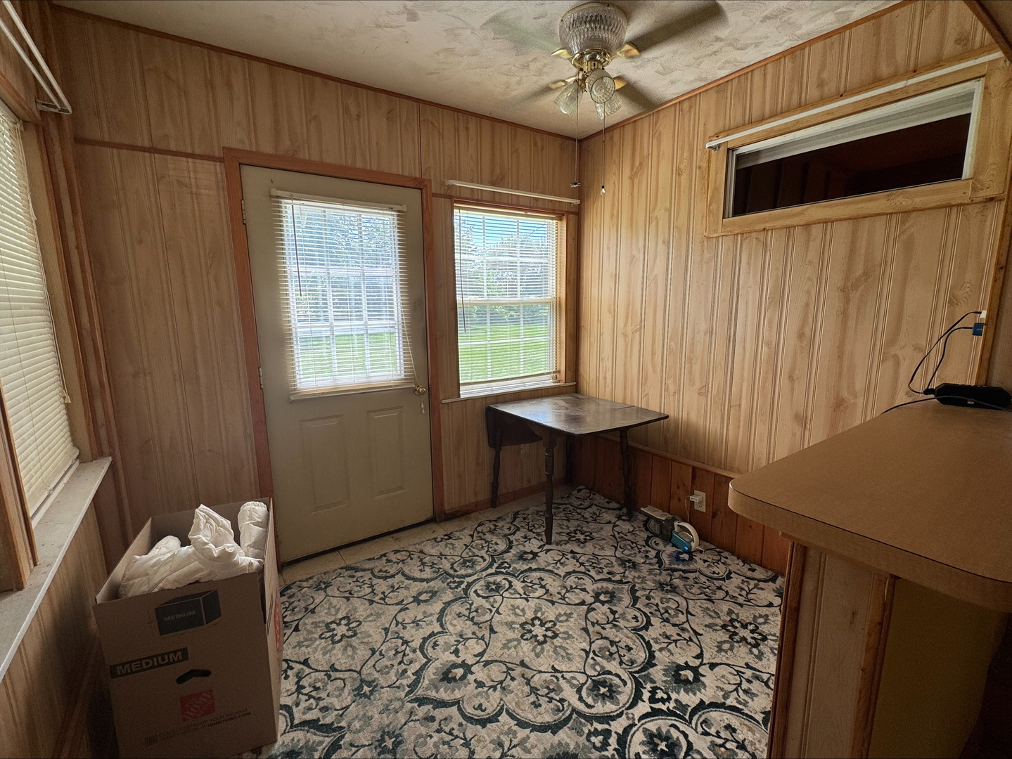 201 East Elm Street Chatsworth, IL 60921 - Photo 10 of 14 a living room with furniture and a window