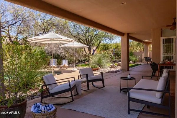 a outdoor living space with furniture and garden view