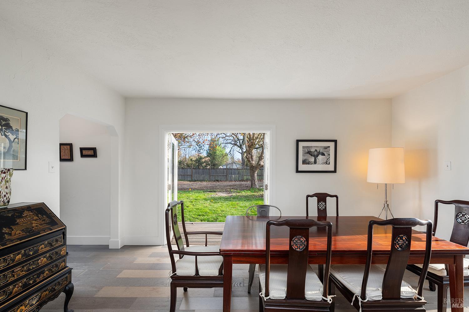 1979 Ludwig Avenue Santa Rosa, CA 95407 - Photo 12 of 52 a view of a dining room with furniture and a potted plant