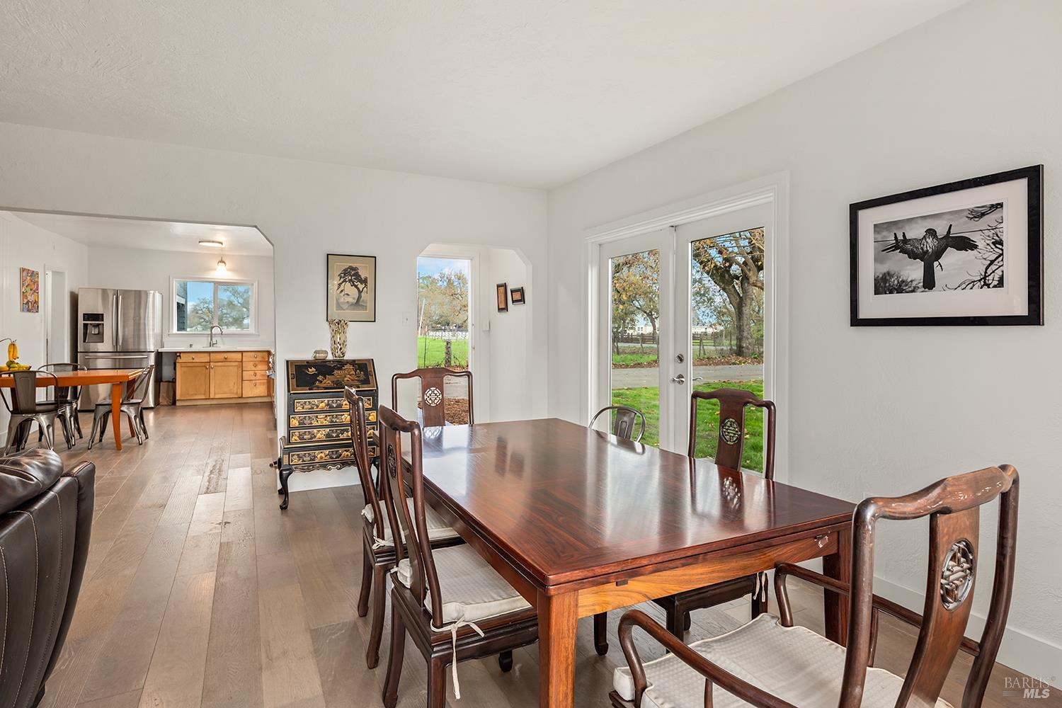 1979 Ludwig Avenue Santa Rosa, CA 95407 - Photo 14 of 52 a view of a dining room with furniture and wooden floor