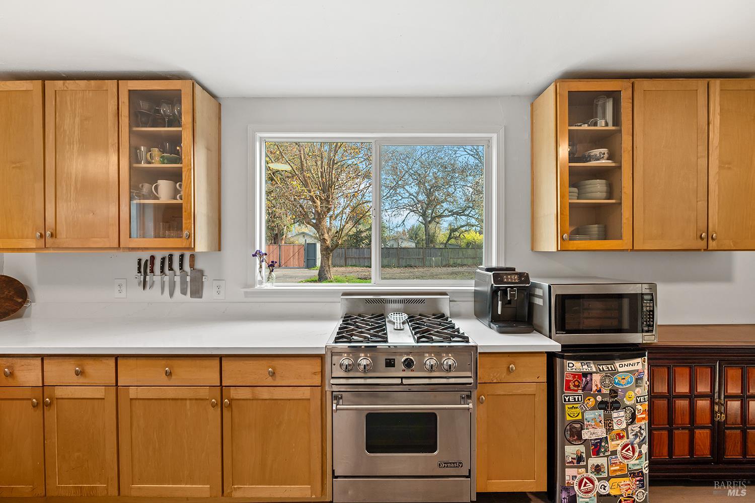 1979 Ludwig Avenue Santa Rosa, CA 95407 - Photo 19 of 52 a kitchen with stainless steel appliances granite countertop a stove and a sink