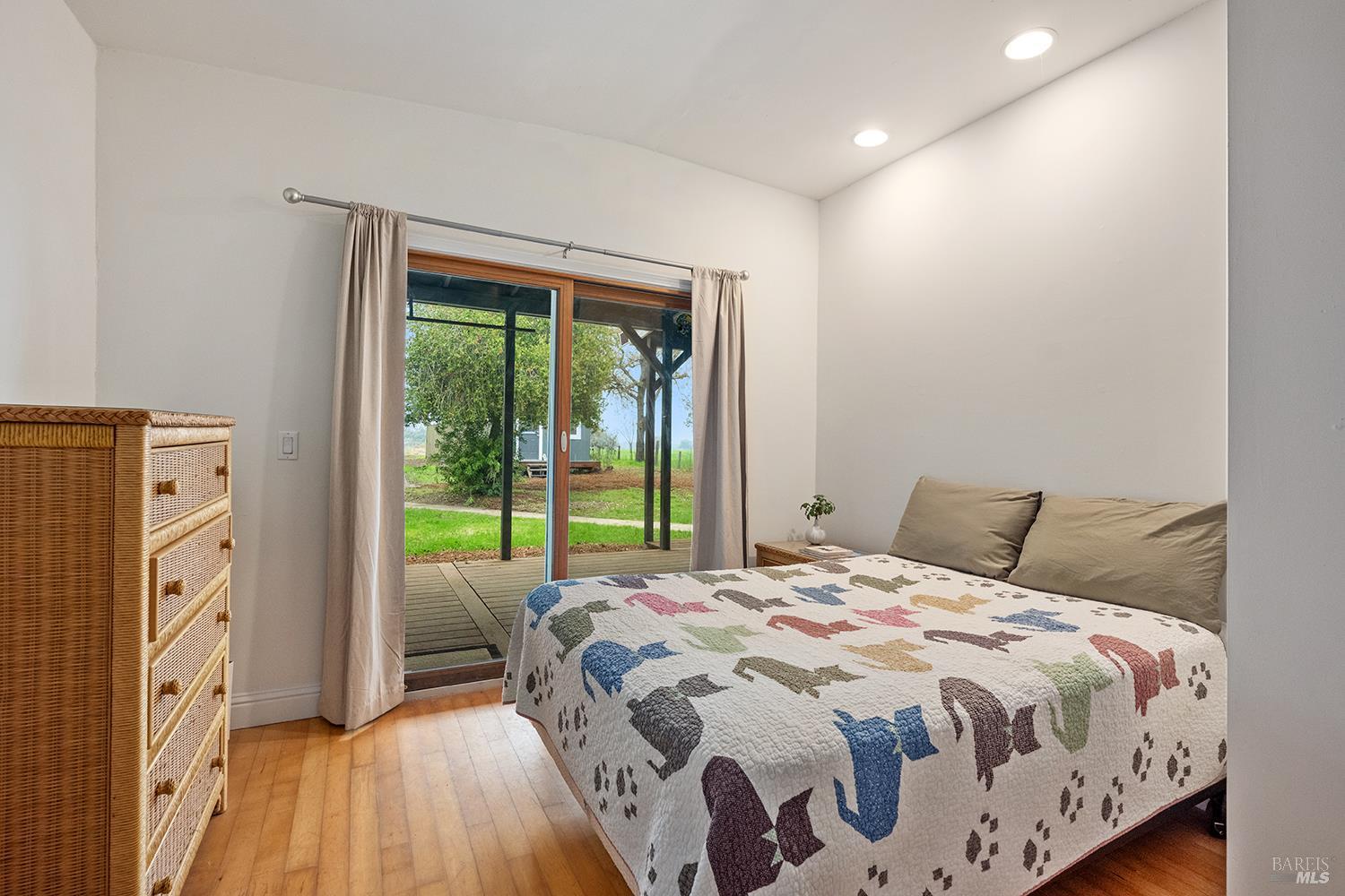 1979 Ludwig Avenue Santa Rosa, CA 95407 - Photo 28 of 52 a large bedroom with a bed and a large window