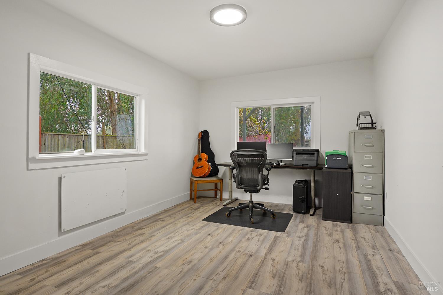 1979 Ludwig Avenue Santa Rosa, CA 95407 - Photo 32 of 52 a view of a workspace with furniture and a window