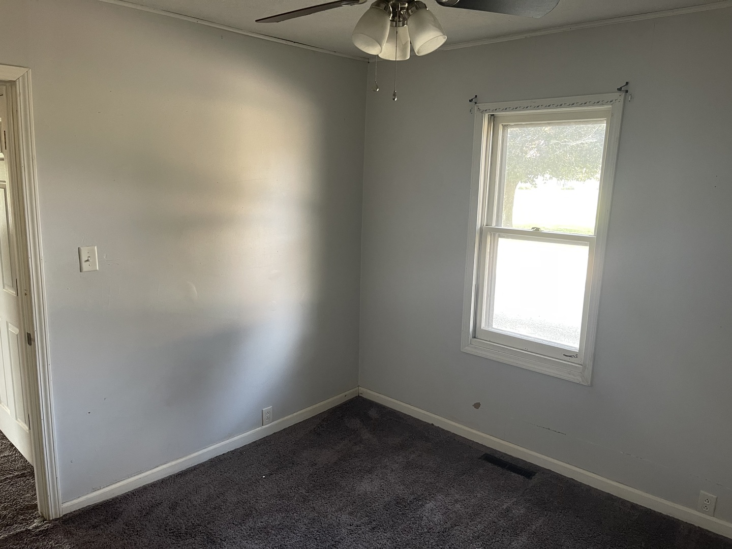 1824 16th Avenue Sterling, IL 61081 - Photo 19 of 26 an empty room with a window