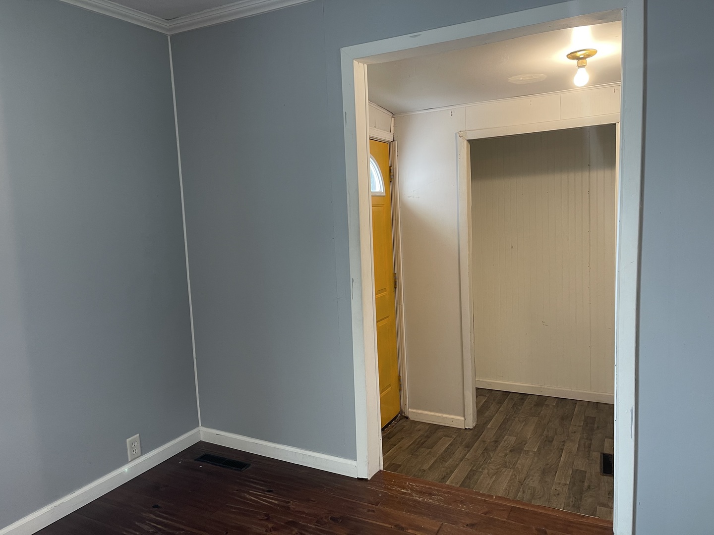 1824 16th Avenue Sterling, IL 61081 - Photo 5 of 26 a view of an empty room with wooden floor and closet