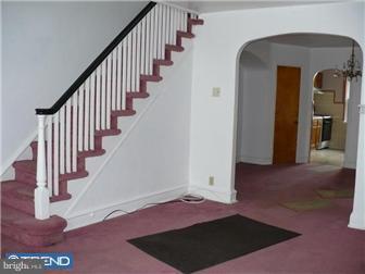 349 Avon Road Upper Darby, PA 19082 - Photo 4 of 10 a view of entryway and hall with wooden floor