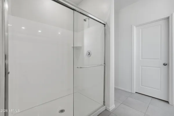 a bath room with a toilet and a bath tub