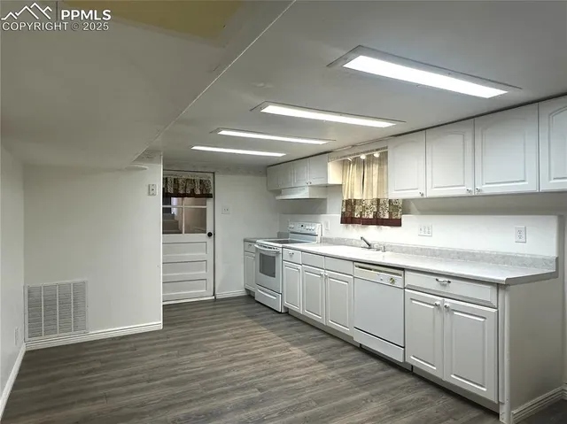 a view of a room with empty shelves