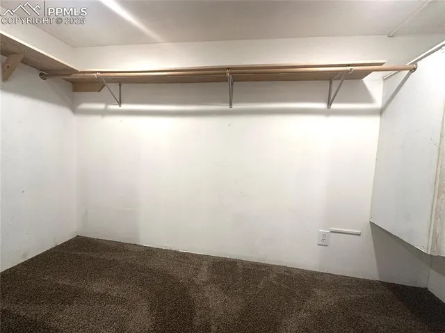 a bathroom with a granite countertop sink mirror and a bathtub