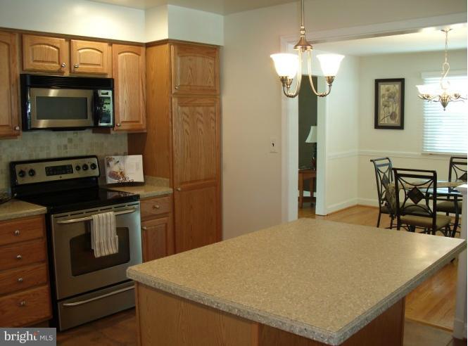 4520 Braddock Road Alexandria, VA 22312 - Photo 14 of 30 Kitchen features island / breakfast bar combo.