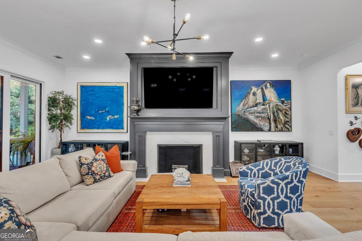 822 Dancy Avenue Savannah, GA 31419 - Photo 13 of 73 a living room with furniture and a fireplace