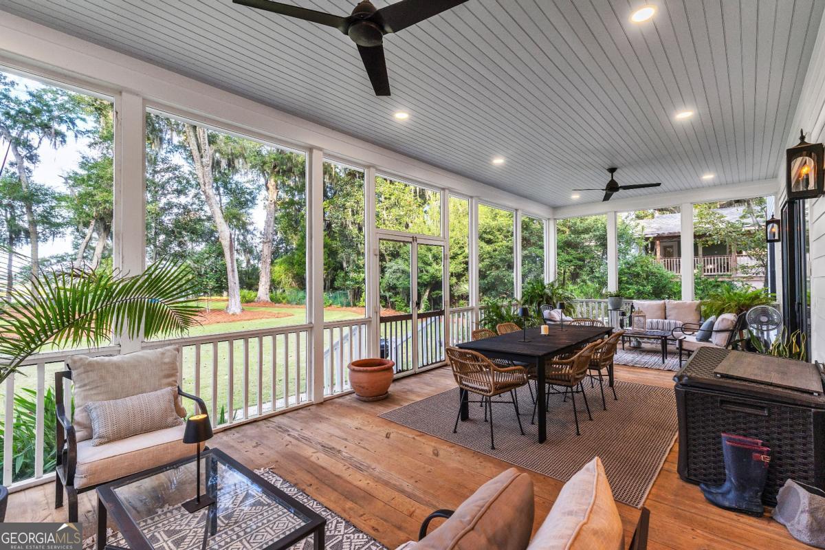 822 Dancy Avenue Savannah, GA 31419 - Photo 24 of 73 a living room with furniture and a large window