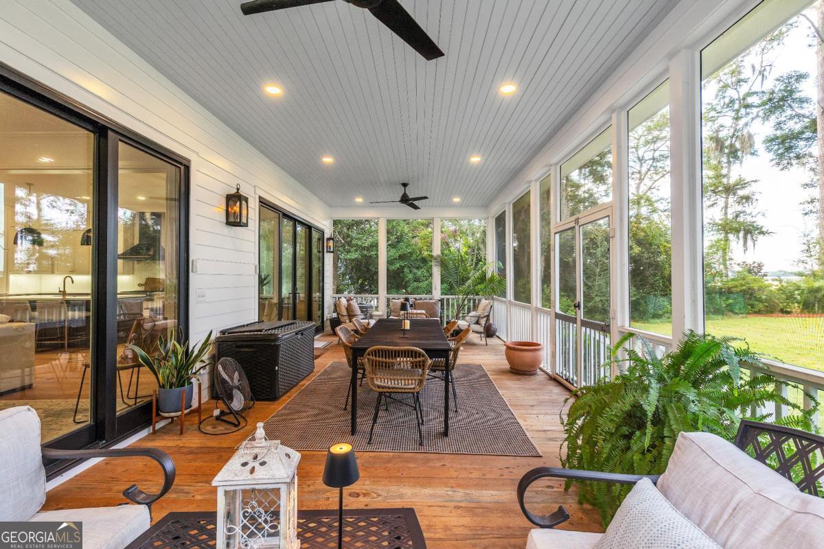 822 Dancy Avenue Savannah, GA 31419 - Photo 25 of 73 a living room with furniture and a large window