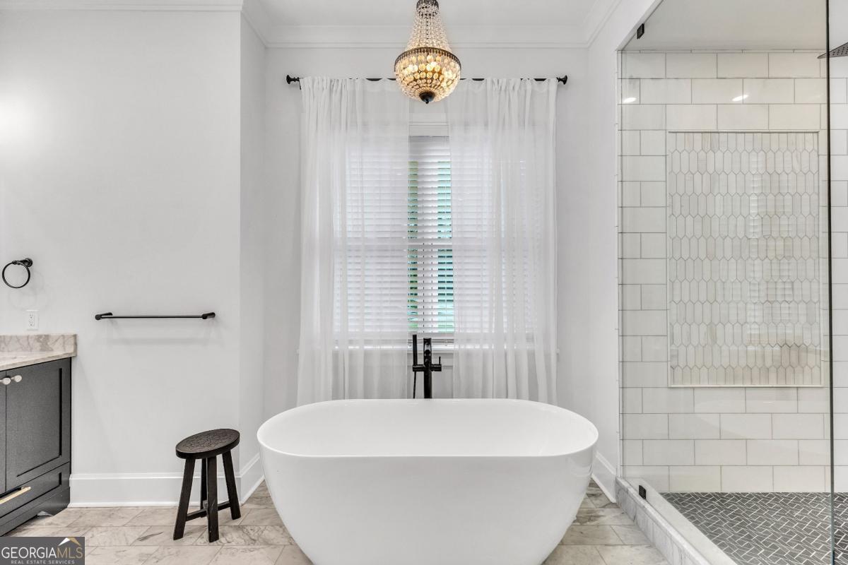 822 Dancy Avenue Savannah, GA 31419 - Photo 28 of 73 a bathroom with a bathtub and a shower