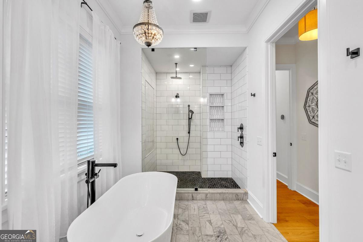 822 Dancy Avenue Savannah, GA 31419 - Photo 29 of 73 a bathroom with a sink a toilet and shower