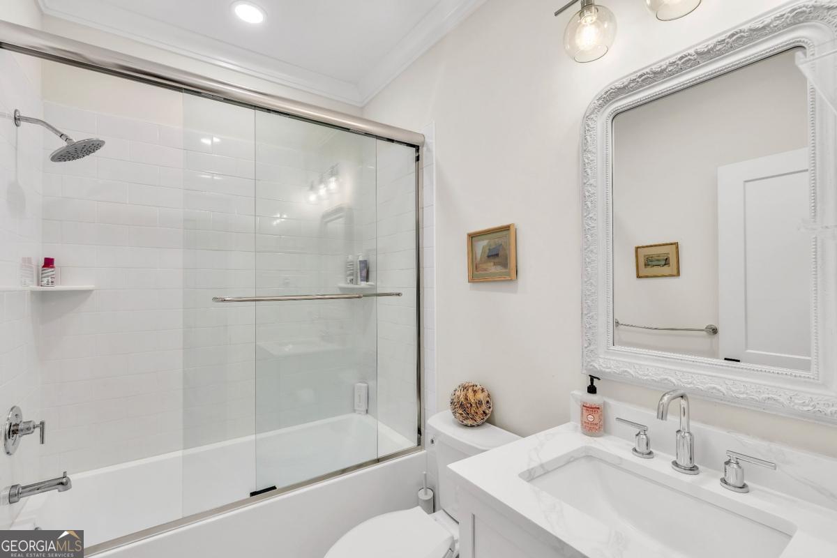 822 Dancy Avenue Savannah, GA 31419 - Photo 49 of 73 a bathroom with a sink toilet and shower