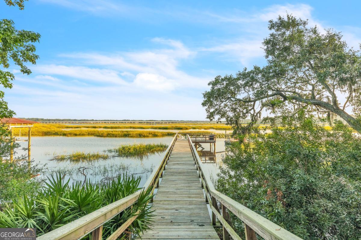 822 Dancy Avenue Savannah, GA 31419 - Photo 6 of 73 a view of swimming pool with a large pool and wooden floor