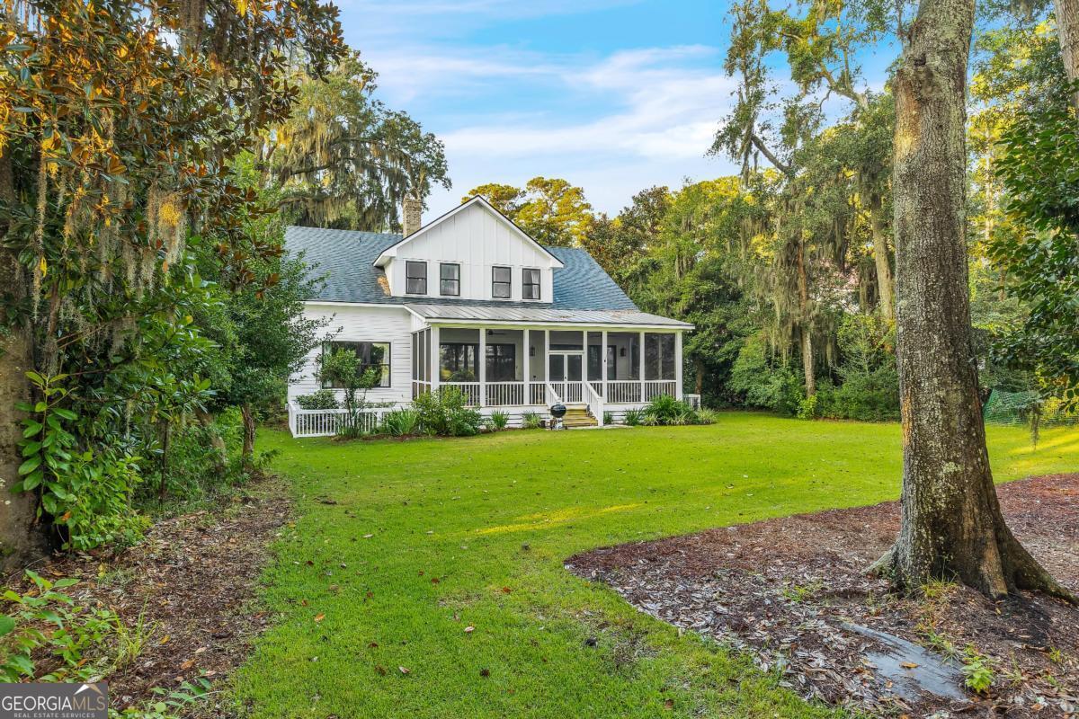 822 Dancy Avenue Savannah, GA 31419 - Photo 70 of 73 a front view of a house with a yard