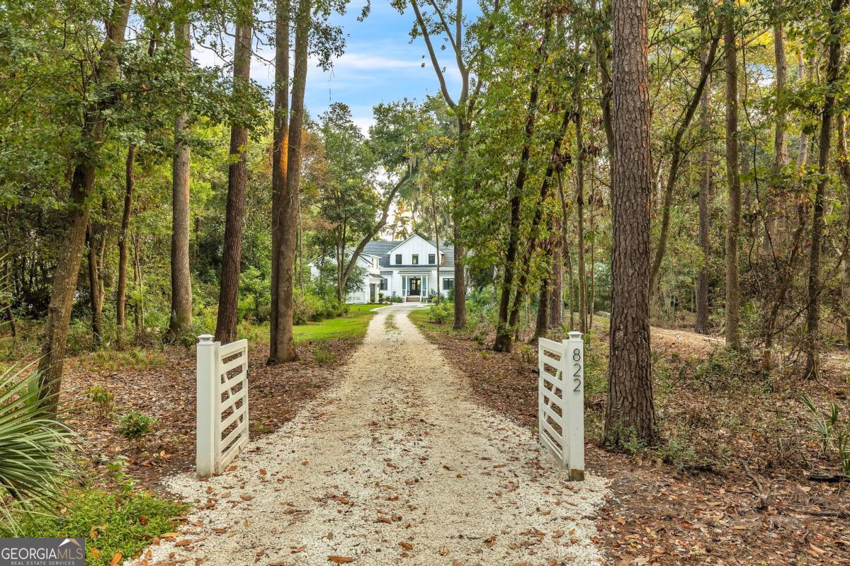 822 Dancy Avenue Savannah, GA 31419 - Photo 9 of 73 a view of a road with large trees