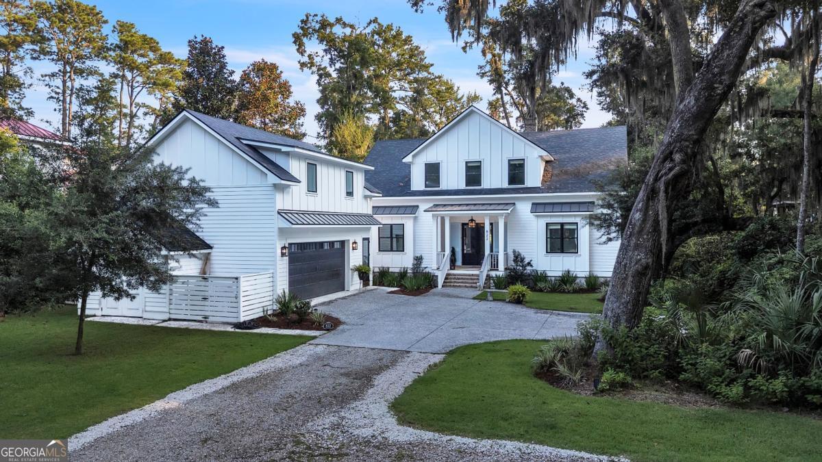 822 Dancy Avenue Savannah, GA 31419 - Photo 10 of 73 a view of house with a yard and potted plants