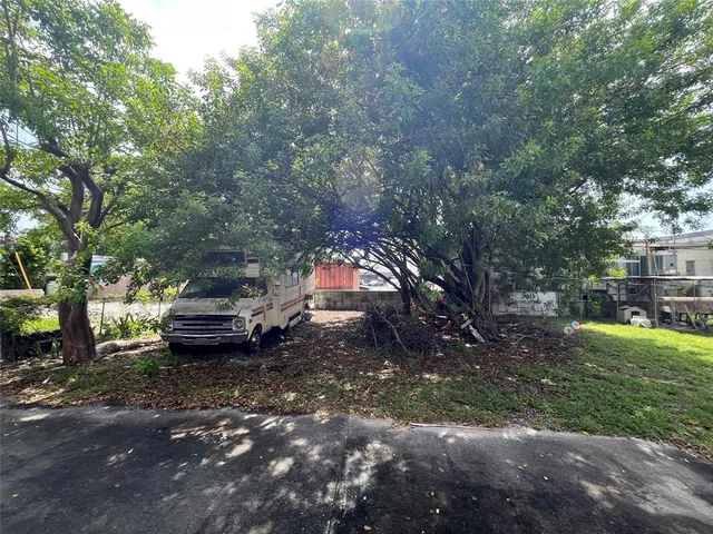 a view of a house with a garden