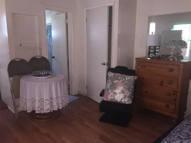 a kitchen with a refrigerator and a stove