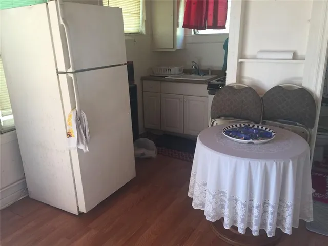 a bathroom with a toilet and a sink
