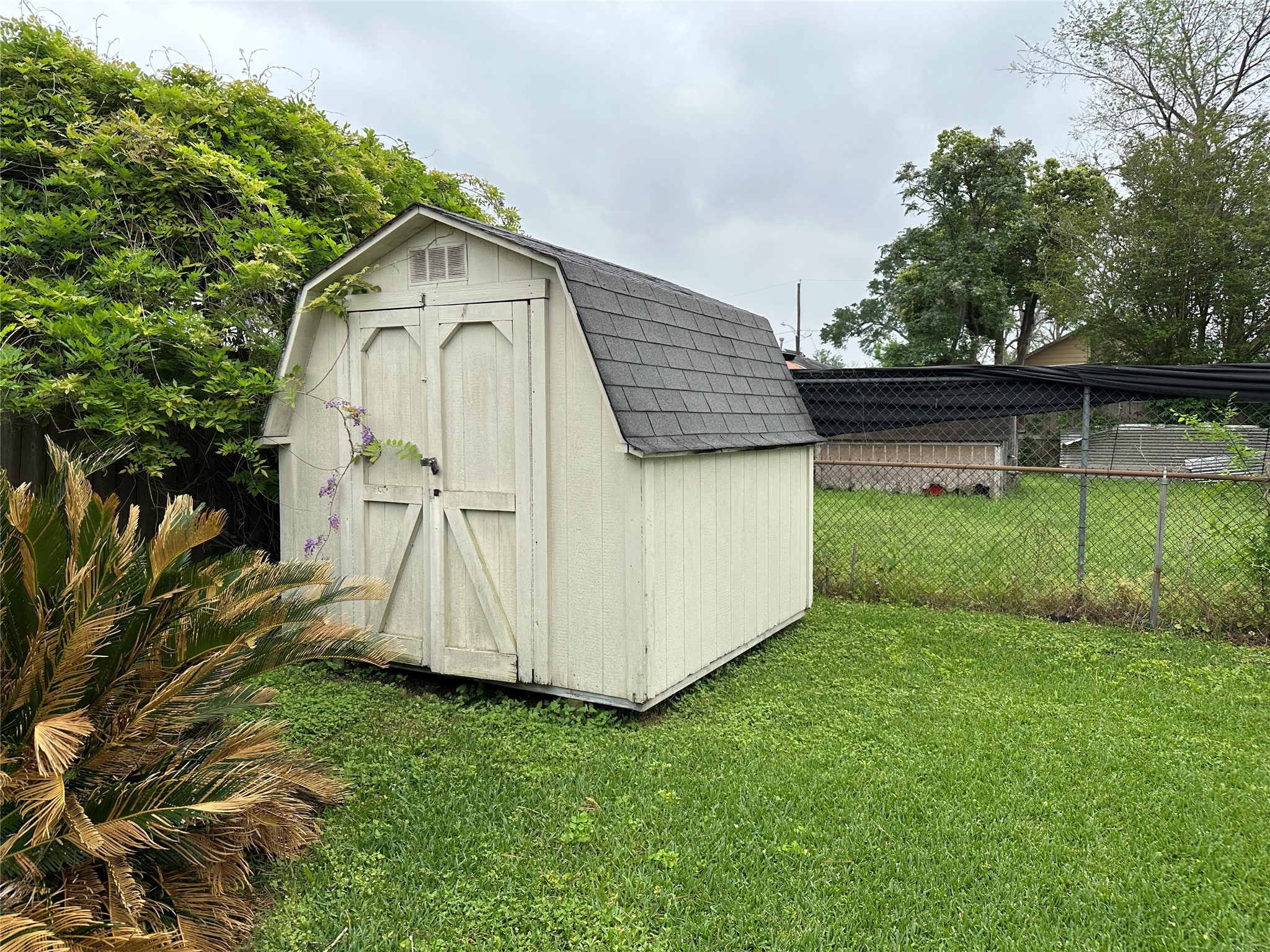 4214 Gano Street Houston, TX 77009 - Photo 11 of 12 a backyard of a house with lots of green space