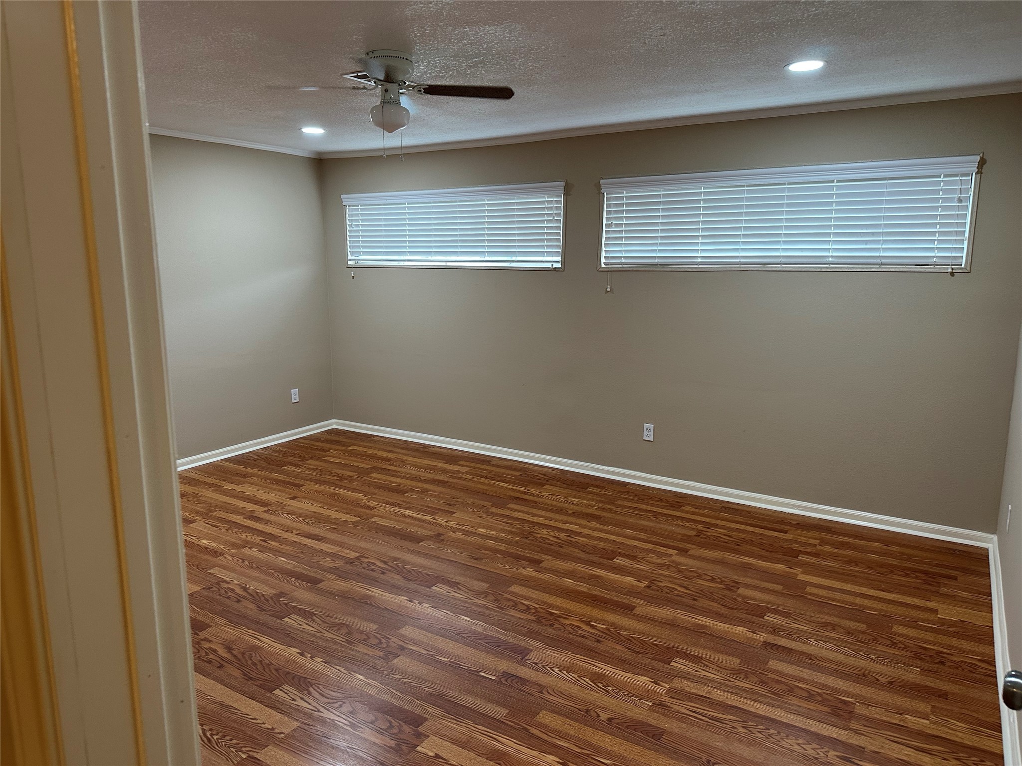 4214 Gano Street Houston, TX 77009 - Photo 8 of 12 en empty room with wooden floor