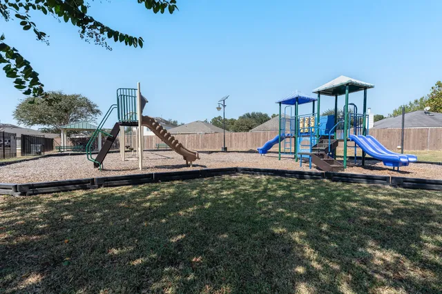 a house view with a garden space