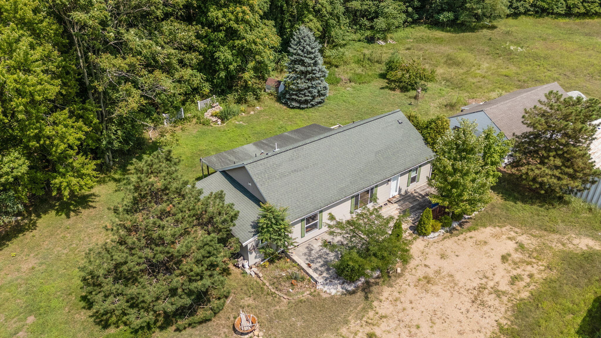 650 Freyer Road Michigan City, IN 46360 - Photo 15 of 49 an aerial view of a house with a yard and lake view