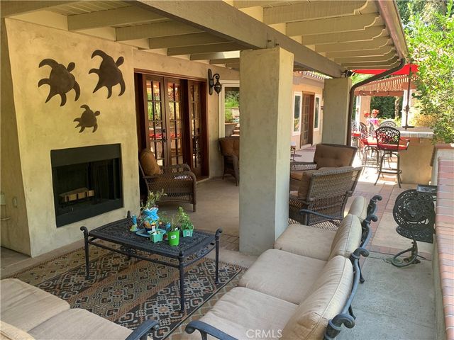 an aerial view of residential houses with outdoor space and street view