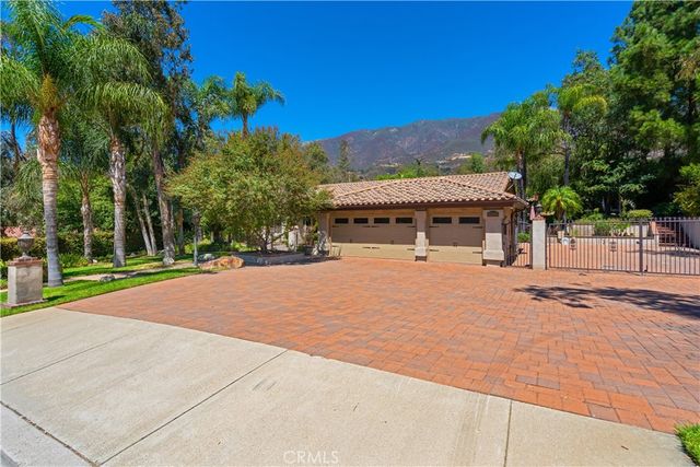 a kitchen with a refrigerator and a stove
