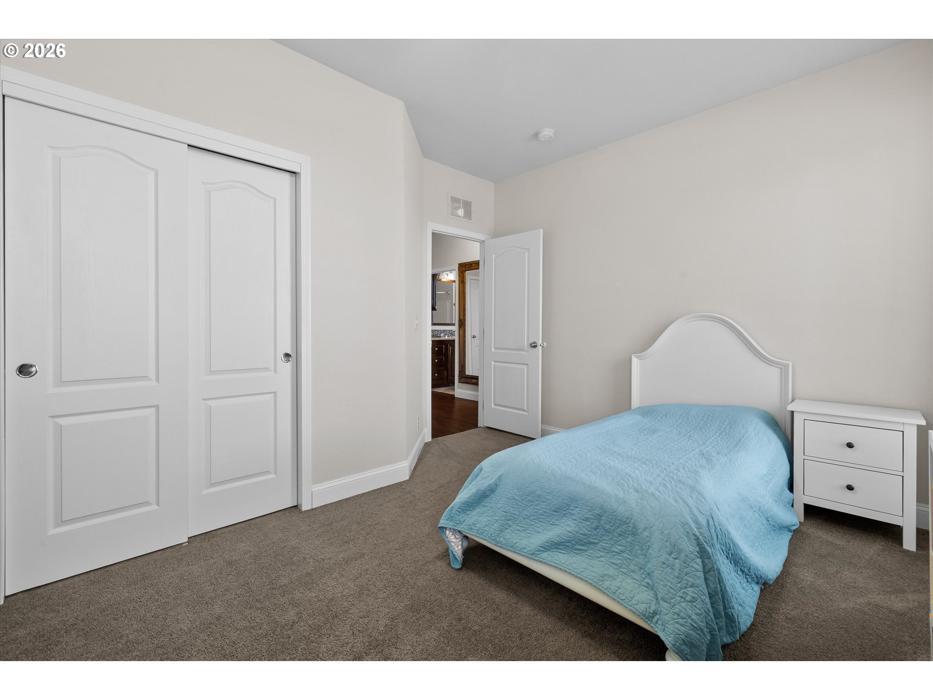 5172 Southeast Oswego Road Prineville, OR 97754 - Photo 15 of 48 a bedroom with a bed and cabinet