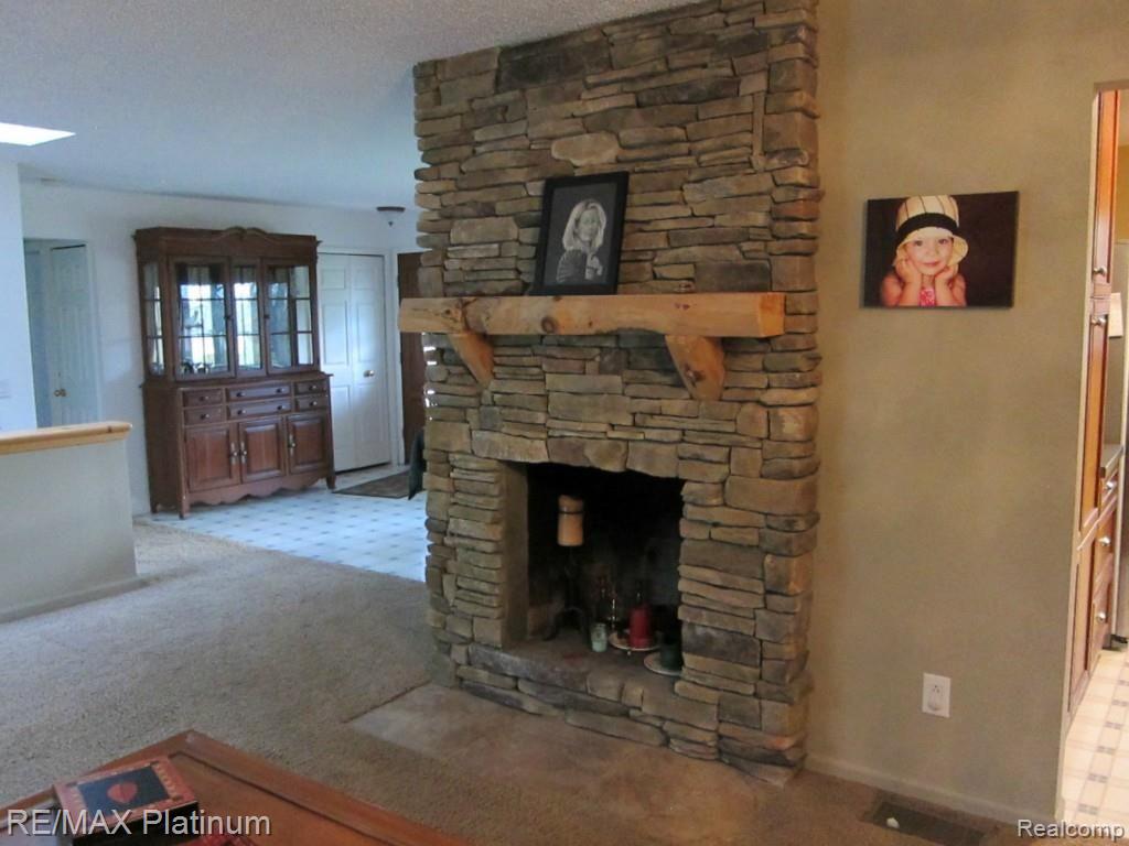 6480 Mack Road Howell, MI 48855 - Photo 3 of 27 Living Room with Natural Fireplace.