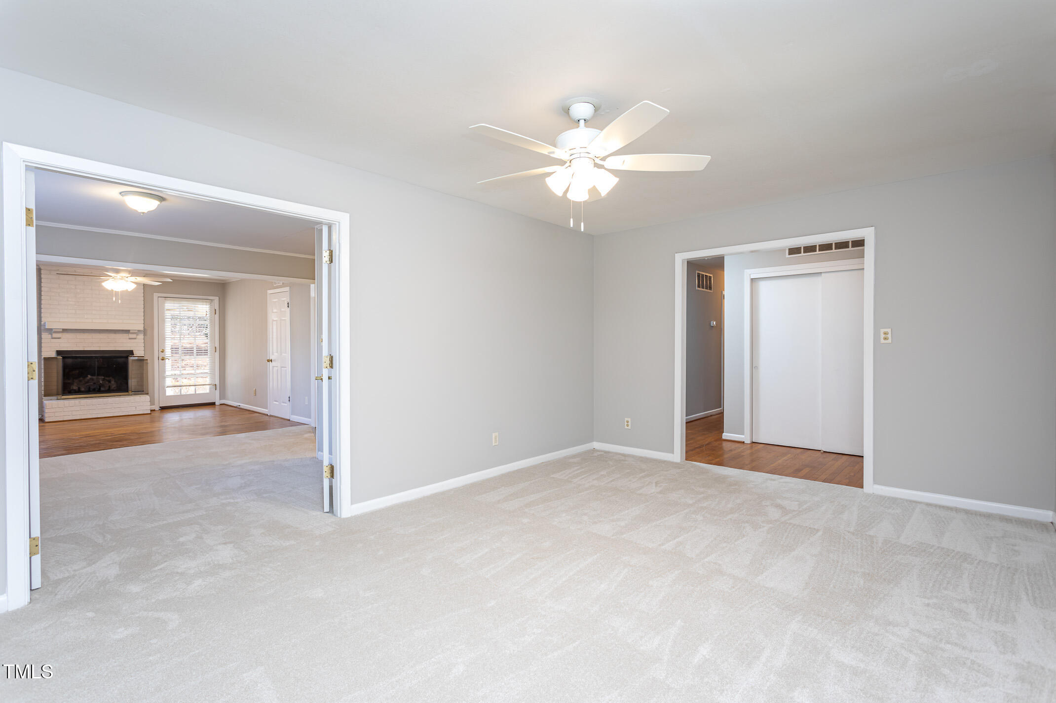 513 Princeton Street Raleigh, NC 27609 - Photo 9 of 25 Living Room view to Den